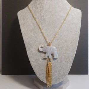 Bourbon and Boweties Carved Stone Elephant with Tassel Necklace.
